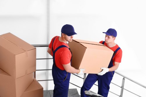 Local removal crew handling furniture during a move