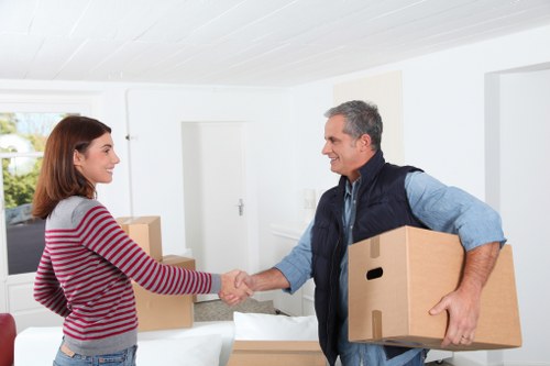 Unpacking service helping settle a family home after moving