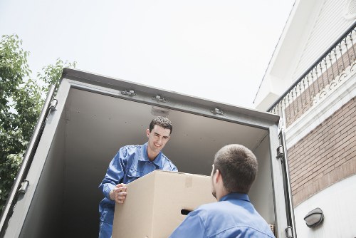 Loading household furniture into a van for a move in Pinner
